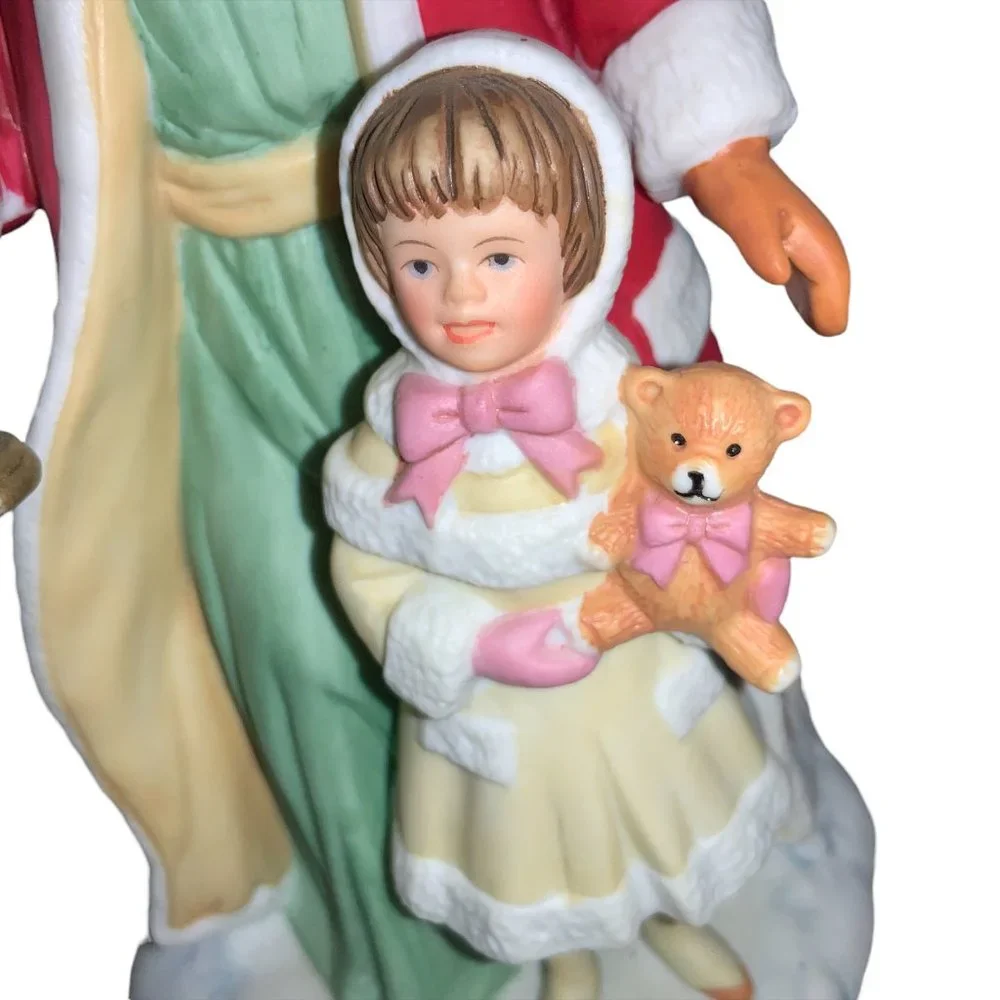 Avon 1995 Ceramic Santa with Child Figurine